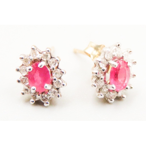 7 - Pair of Ruby and Diamond Set Ladies Cluster Earrings Mounted in 9 Carat Yellow Gold 7mm High