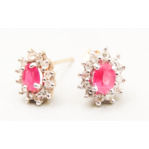 7 - Pair of Ruby and Diamond Set Ladies Cluster Earrings Mounted in 9 Carat Yellow Gold 7mm High