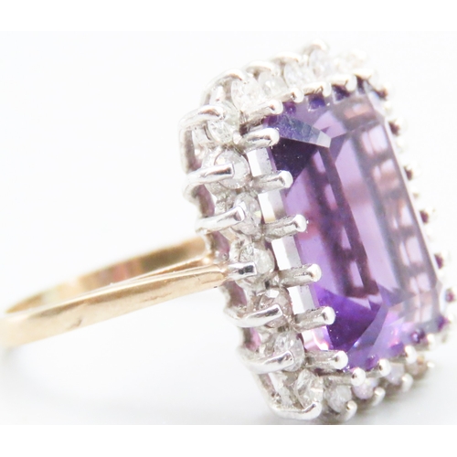 70 - Emerald Cut Amethyst Centre Stone Ring with Diamond Set Halo Surround Mounted in 9 Carat Yellow Gold... 