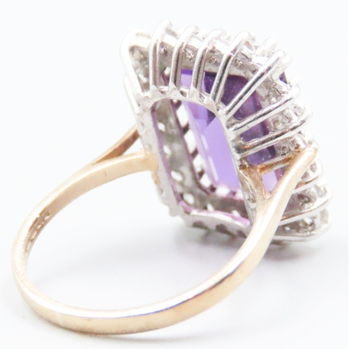 70 - Emerald Cut Amethyst Centre Stone Ring with Diamond Set Halo Surround Mounted in 9 Carat Yellow Gold... 