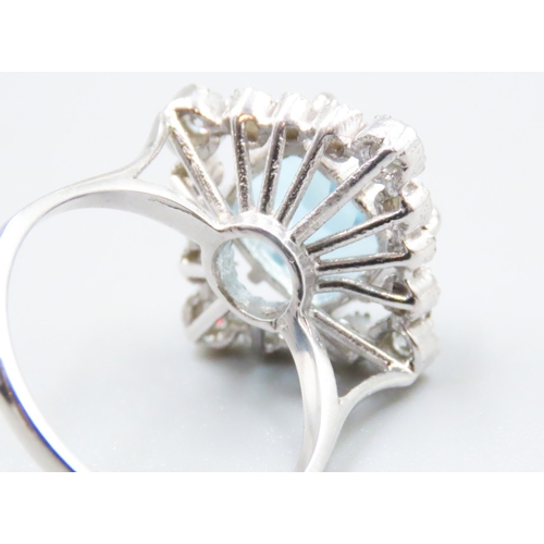 73 - Cushion Cut Sky Blue Topaz Centre Stone Ring with Diamond Set Halo Surround Mounted in 9 Carat White... 