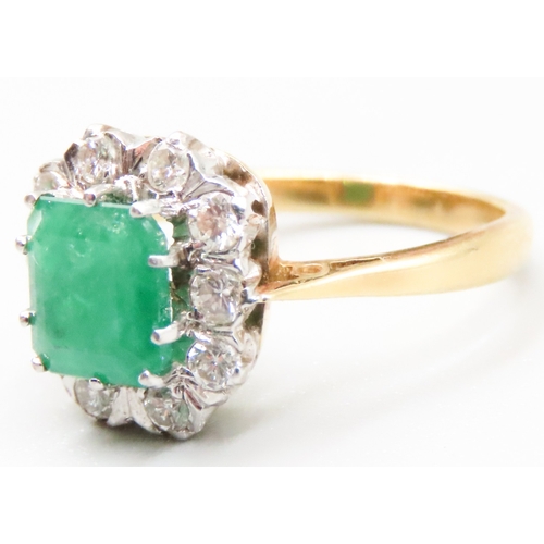 93 - 1950's Emerald Centre Stone Ring with Ten Diamond Set Surround Mounted in 18 Carat Yellow Gold Total... 