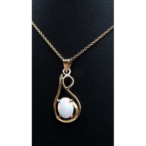 97 - Opal Set 18 Carat Yellow Gold Pendant 3cm High Further Set on 9 Carat Yellow Gold Chain 42cm Long