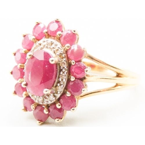 1 - Ruby and Diamond Set Ladies Cluster Ring Mounted in 9 Carat Yellow Gold Ring Size P