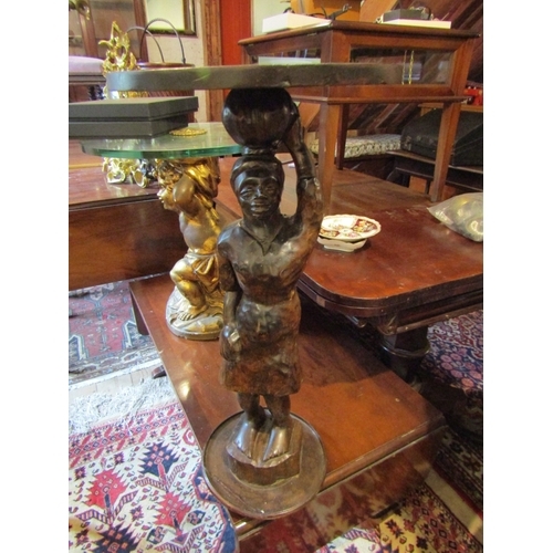 1199 - Carved Hardwood Blackamoor Figure Decorated Occasional Table Circular Top Approximately 28 Inches Hi... 