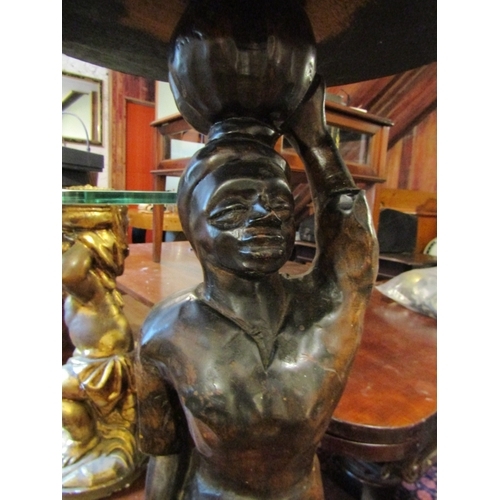 1199 - Carved Hardwood Blackamoor Figure Decorated Occasional Table Circular Top Approximately 28 Inches Hi... 