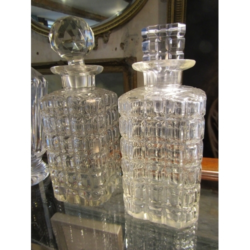 1246 - Three Irish Cut Crystal Decanters Stoppers Present Tallest Approximately 12 Inches High