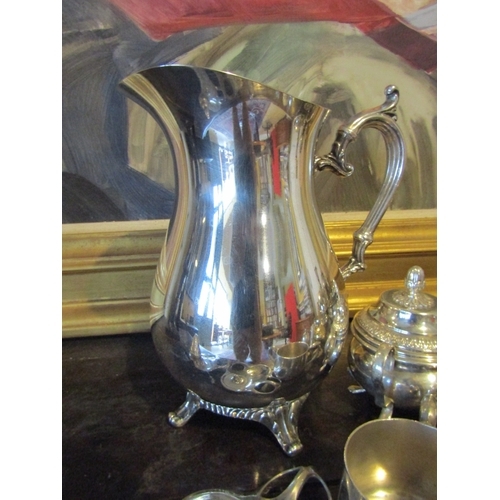 1403 - Collection of Various Silver Plate Including Gravy Boat Lemonade Jug Candle Sticks, etc. Quantity as... 