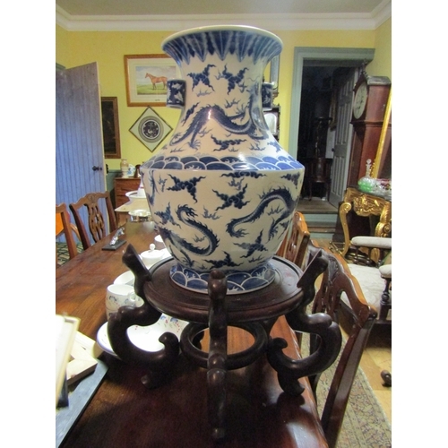 1611 - Oriental Blue and White Shaped Form Vase Attractively Detailed with Hardwood Rest Vase Approximately... 