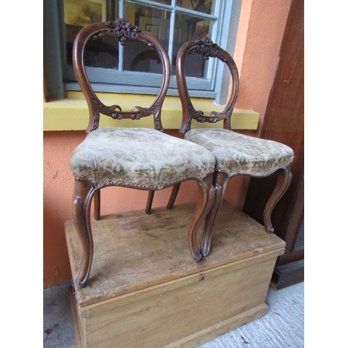 1405 - Pair of Victorian Walnut Chairs Well Carved Needlepoint Seats above Cabriole Supports