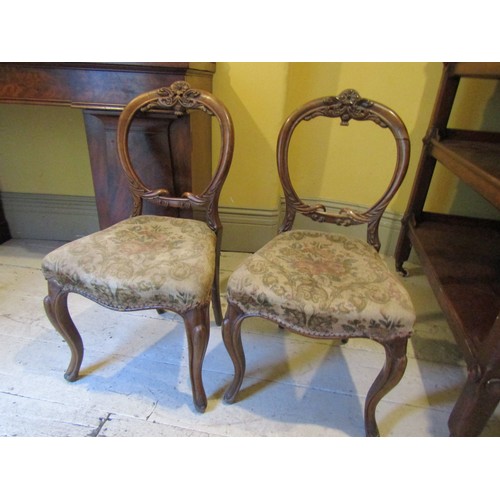 1405 - Pair of Victorian Walnut Chairs Well Carved Needlepoint Seats above Cabriole Supports