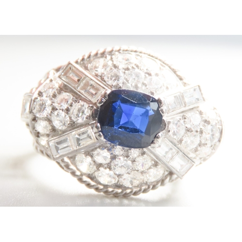 102 - Attractively Detailed Sapphire Centre Stone Ring with Round Cut and Baguette Cut Diamond Cluster Mou... 