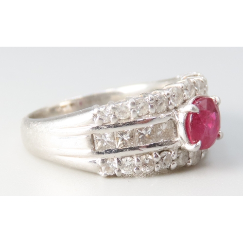 103 - Ruby Centre Stone with Round Cut and Square Cut Diamonds Set Three Row Mounted in Platinum Ring Size... 