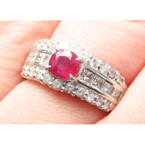 103 - Ruby Centre Stone with Round Cut and Square Cut Diamonds Set Three Row Mounted in Platinum Ring Size... 