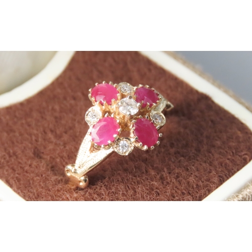 105 - Ruby and Diamond Set Ladies Cluster Ring Attractively Detailed Mounted in 9 Carat Yellow Gold Ring S... 