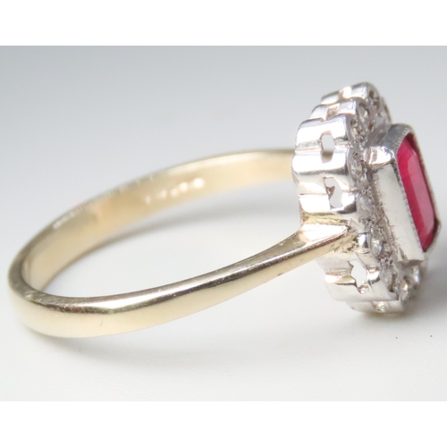 106 - Bezel Set Ruby and Diamond Set Halo Surround Ring Mounted in 9 Carat Yellow Gold Ring Size N and a H... 