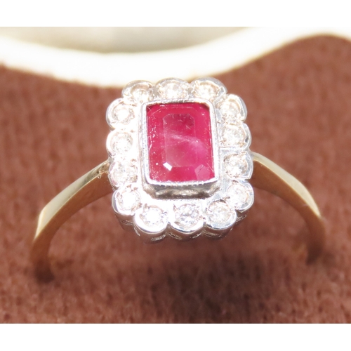 106 - Bezel Set Ruby and Diamond Set Halo Surround Ring Mounted in 9 Carat Yellow Gold Ring Size N and a H... 