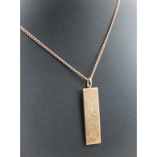 11 - 9 Carat Yellow Gold Ingot Pendant 5cm High Set on 9 Carat Yellow Gold Chain 56cm Long