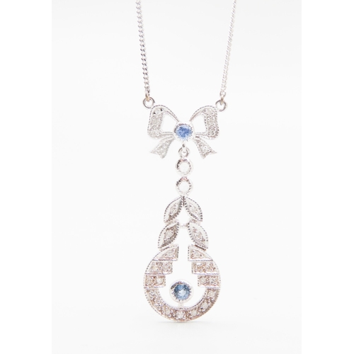 111 - Finely Detailed Diamond and Tanzanite Set Bow Motif Necklace Set in 9 Carat White Gold Pendant Drop ... 