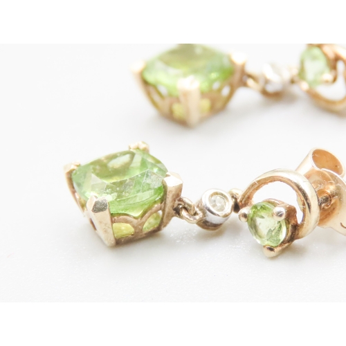 113 - Pair of Peridot and Diamond Set Ladies Drop Earrings Mounted in 9 Carat Yellow Gold 2cm High