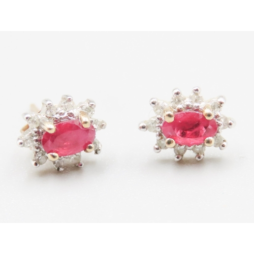 115 - Pair of Ruby and Diamond Set Ladies Cluster Earrings Mounted in 9 Carat Yellow Gold 7mm High