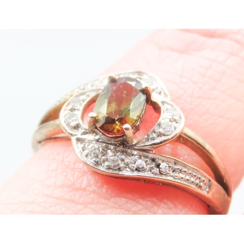 117 - Attractively Detailed Garnet and Diamond Set Ladies Cluster Ring Mounted in 9 Carat Yellow Gold Ring... 