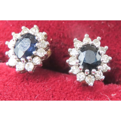 119 - Pair of Sapphire and Diamond Set Cluster Earrings Mounted in 9 Carat White Gold 7mm High