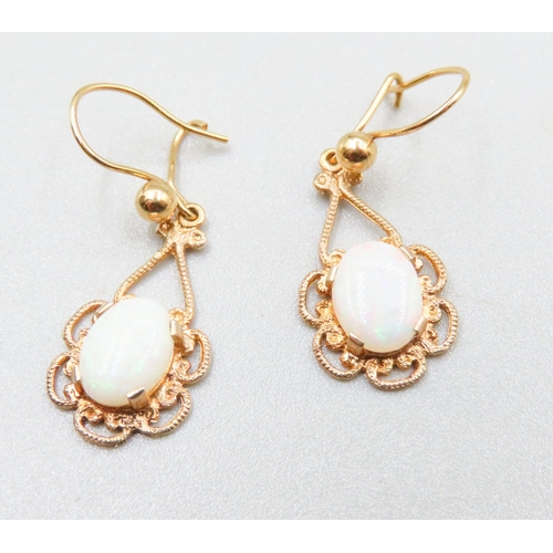 121 - Pair of Finely Detailed Opal Set Earrings Mounted in 9 Carat Yellow Gold 2cm Drop