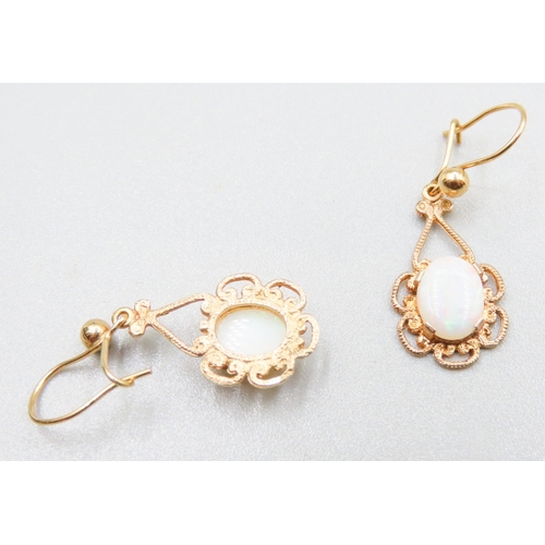 121 - Pair of Finely Detailed Opal Set Earrings Mounted in 9 Carat Yellow Gold 2cm Drop