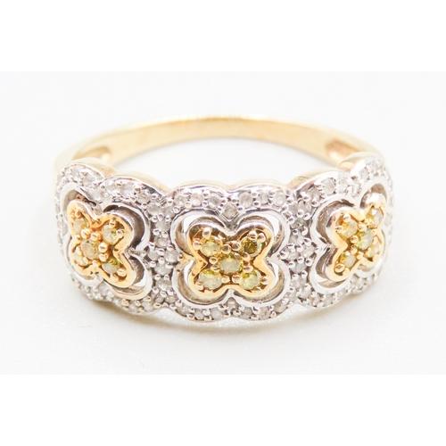 137 - Attractively Detailed White and Yellow Diamond Clover Motif Set Ring Mounted in 9 Carat Yellow Gold ... 