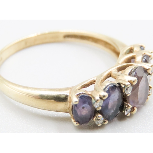 138 - Kunzite Five Stone Graduated Form Trellis Set Ring Mounted in 9 Carat Yellow Gold Ring Size T and a ... 