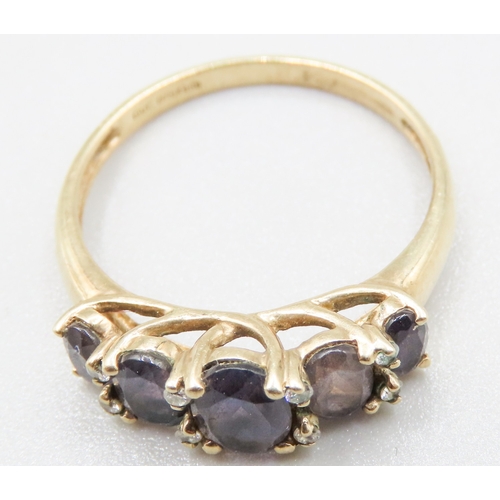 138 - Kunzite Five Stone Graduated Form Trellis Set Ring Mounted in 9 Carat Yellow Gold Ring Size T and a ... 