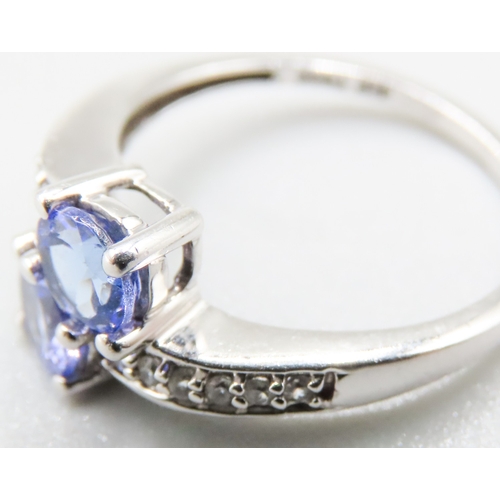 140 - Tanzanite Set Toi et Moi Ring with Further Diamond Insets to Shoulders Mounted on 10 Carat White Gol... 