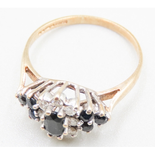 142 - Sapphire and Diamond Set Ladies Cluster Ring Mounted in 9 Carat Yellow Gold Ring Size M and a Half