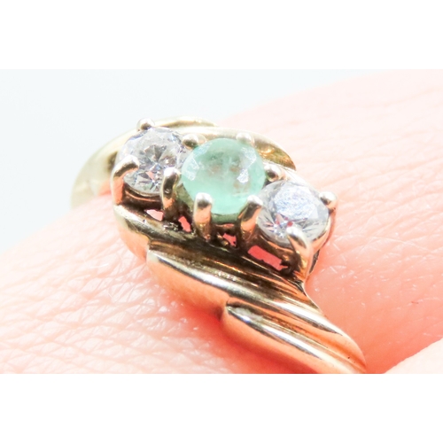 143 - Emerald and Gemstone Set Three Stone Wrap Around Form Ring Mounted in 9 Carat Yellow Gold Ring Size ... 