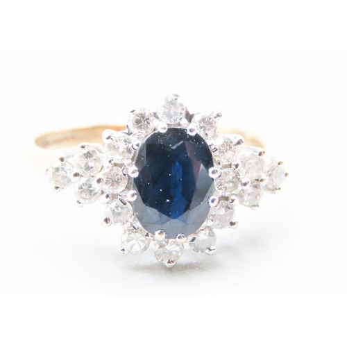 144 - Sapphire Centre Stone Ring with Diamond Set Halo Surround and Further Diamonds Set to Shoulders Moun... 