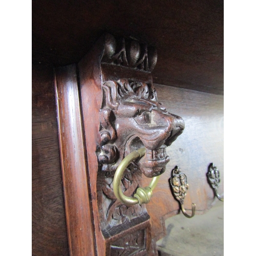 1528 - Antique Oak Coat Hanging Shelf with Carved Lion End Supports Approximately 50 Inches Wide x 12 Inche... 