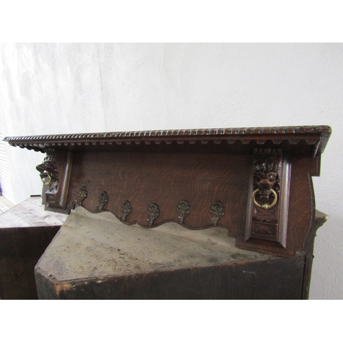 1528 - Antique Oak Coat Hanging Shelf with Carved Lion End Supports Approximately 50 Inches Wide x 12 Inche... 