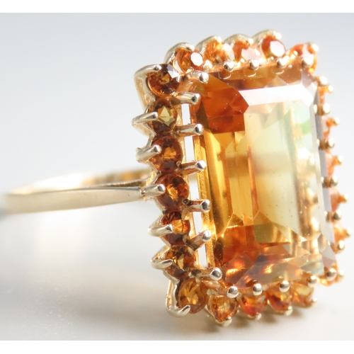 153 - Emerald Cut Citrine Set Ring with Further Citrine Set Halo Mounted in 9 Carat Yellow Gold Ring Size ... 