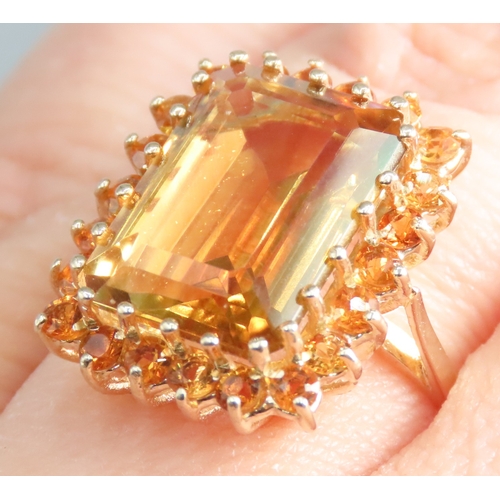 153 - Emerald Cut Citrine Set Ring with Further Citrine Set Halo Mounted in 9 Carat Yellow Gold Ring Size ... 