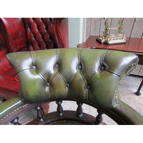 1530 - Green Leather Deep Buttoned Upholstered Captain's Office Armchair Rail form Supports Above Swivel Ba... 