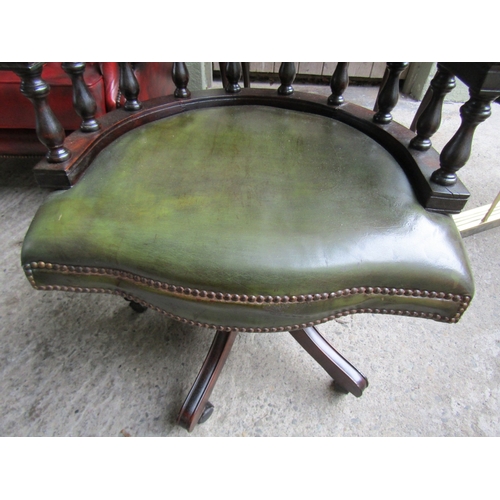 1530 - Green Leather Deep Buttoned Upholstered Captain's Office Armchair Rail form Supports Above Swivel Ba... 