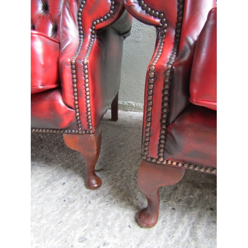 1556 - Pair of Burgundy Leather Deep Buttoned Upholstered Wing Back Armchairs Mahogany Cabriole Supports Br... 