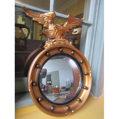 1581 - Pair of Gilded Convex Mirrors Eagle Motif Surmounts Each Mirror Approximately 12 Inches Diameter