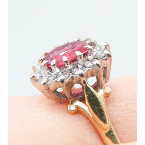 175 - Ruby Centre Stone Ring with Diamond Set Halo Surround Mounted in 18 Carat Yellow Gold Ring Size V