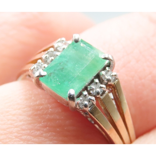 179 - Emerald Set Ring Mounted in 14 Carat Yellow Gold Further Diamonds Set to Shoulders Ring Size P