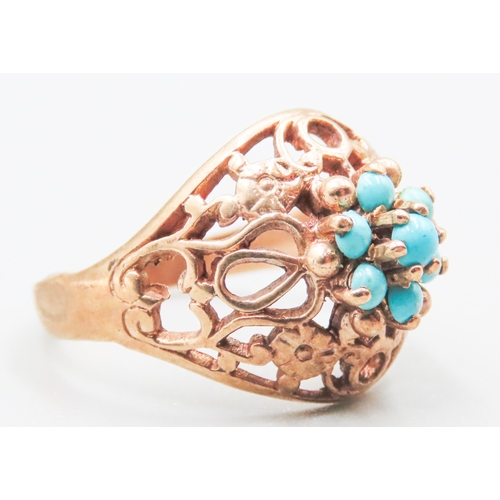 18 - Finely Detailed Filigree Form Turquoise Set Ring Mounted in 9 Carat Rose Gold Ring Size O