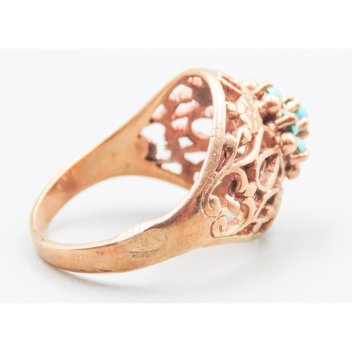 18 - Finely Detailed Filigree Form Turquoise Set Ring Mounted in 9 Carat Rose Gold Ring Size O