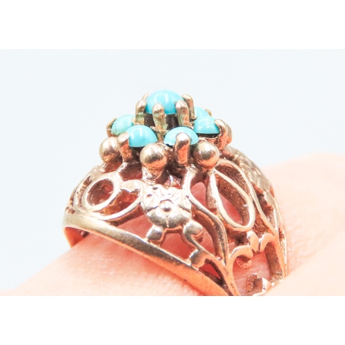 18 - Finely Detailed Filigree Form Turquoise Set Ring Mounted in 9 Carat Rose Gold Ring Size O