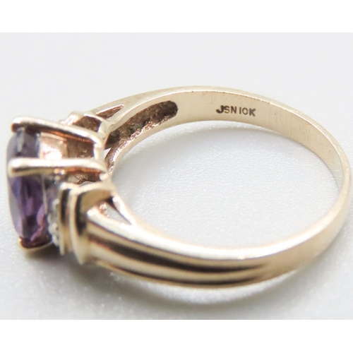 200 - Amethyst Set Ring Mounted in 10 Carat Yellow Gold with Diamonds Set to Shoulders Ring Size J